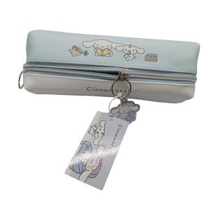 Sanrio cinnamoroll baby blue and pencil case with a charm.